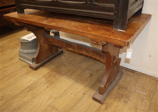 An oak refectory dining table L.137cm